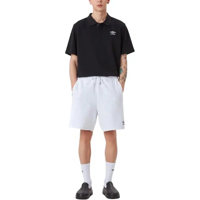 umbro Essential Cara logoPolo