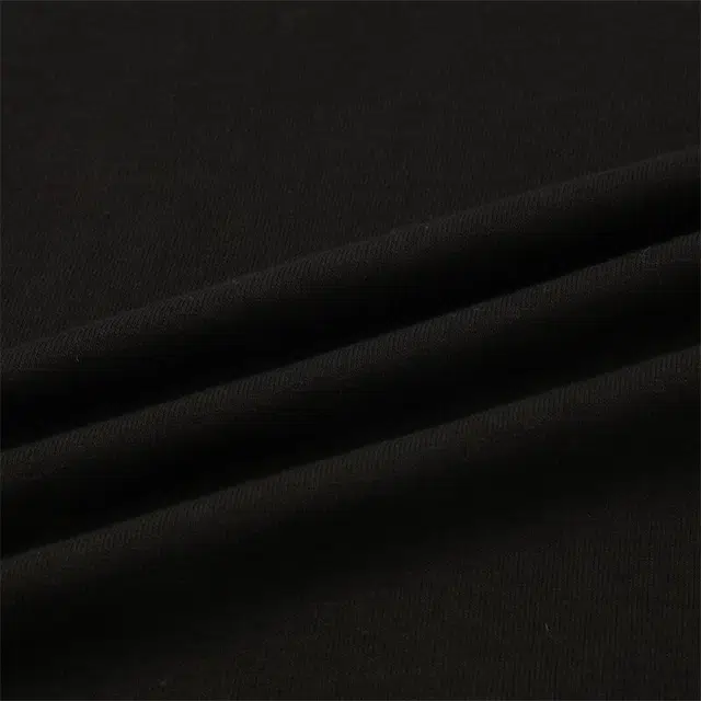 PUMA CLASSICS UNITED IN MOTION T7 TEE logoT