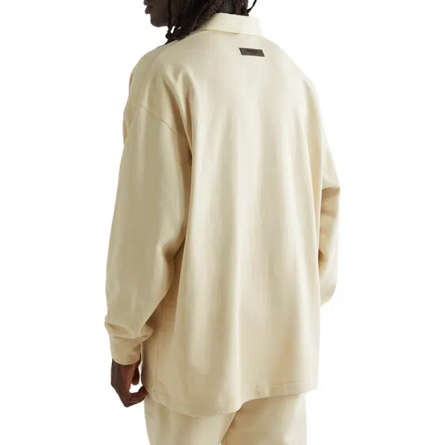 Fear of God Essentials FW22 1977 Henley Rugby in Egg Shell Polo
