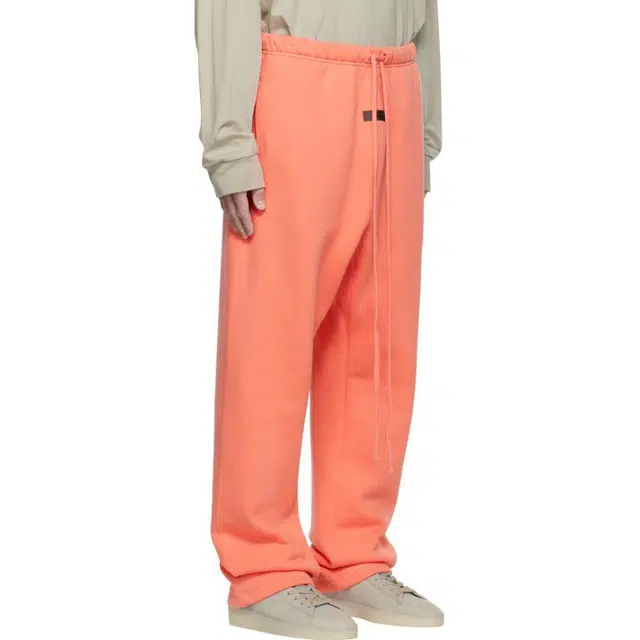 Fear of God Essentials FW22 Relaxed Sweatpant Coral Logo