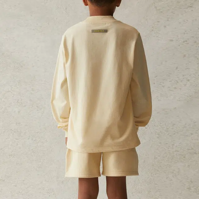 Fear of God Essentials SS21 Kids Long Sleeve Tee ButtercreamCream LogoT