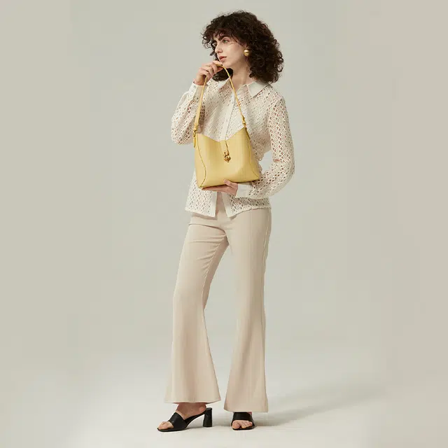 西木汀 高级感小众设计师浪漫症大容量 牛皮 水桶包单肩斜挎包 女款 黄色