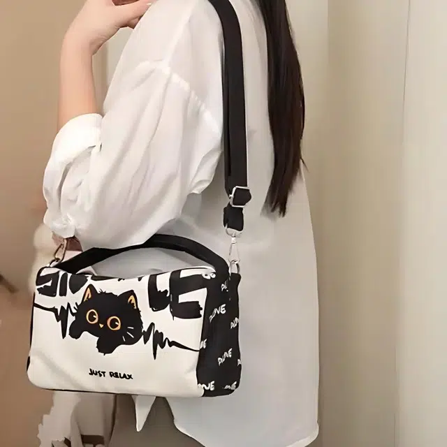 奥松 潮流可爱卡通 绒面科技布 斜挎包 女款 黑白色