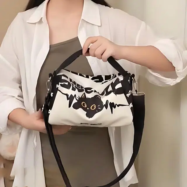 奥松 潮流可爱卡通 绒面科技布 斜挎包 女款 黑白色