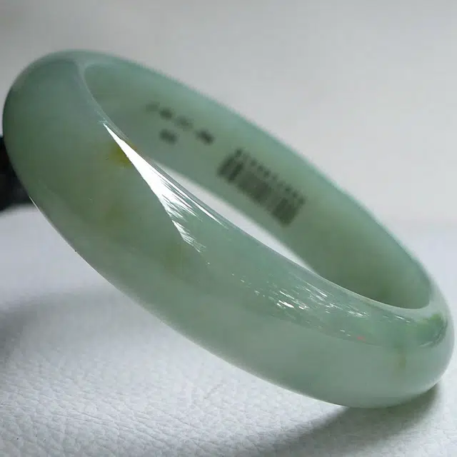 57.3mm