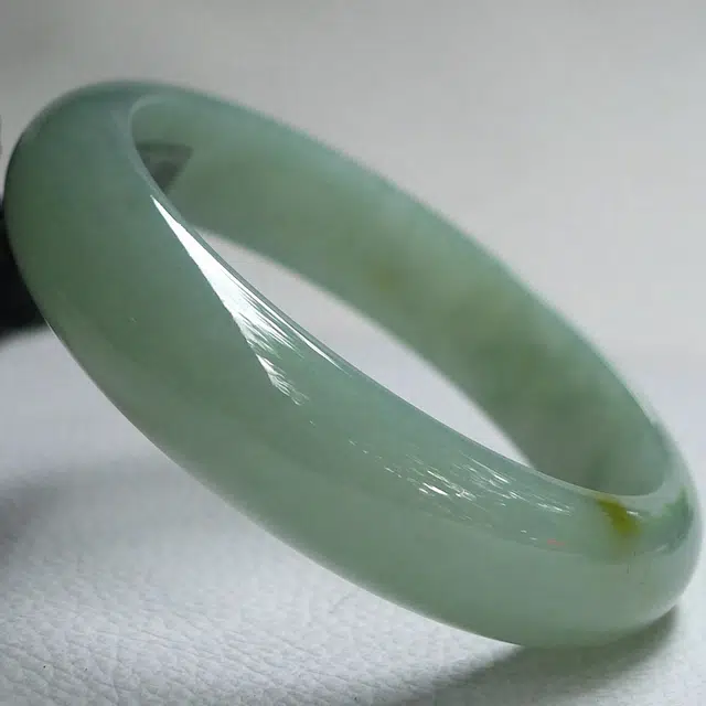 57.3mm