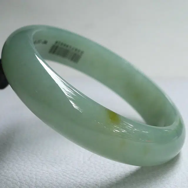 57.3mm