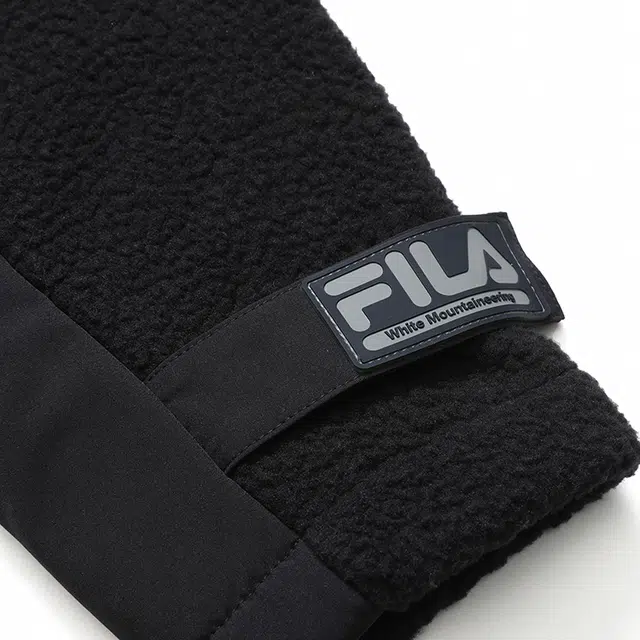 FILA FUSION x White Mountaineering logo