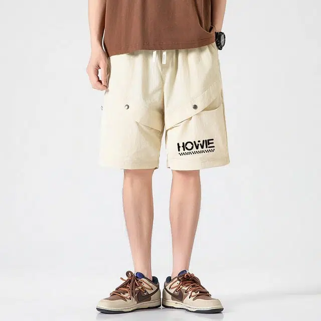 HOWIE LANDAU logo
