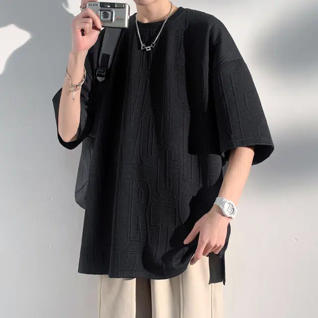 NXNM T