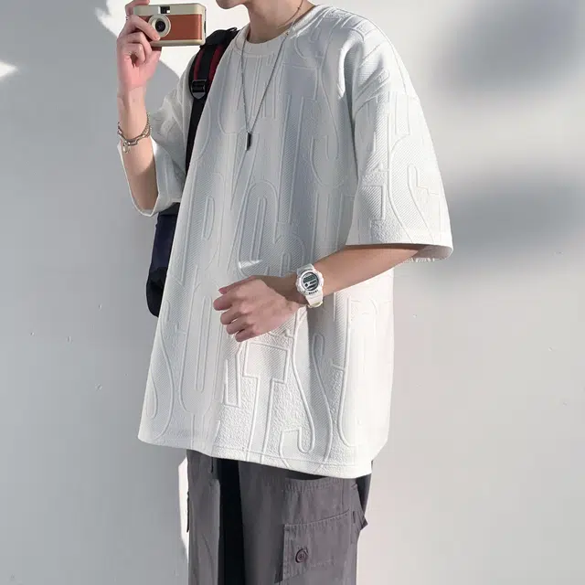 NXNM T