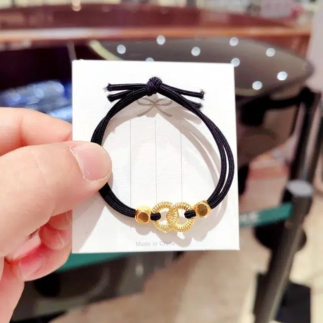 前方大荒野 哑光黑环绕双结橡皮筋精致优雅温柔简约时尚设计清冷感日常通勤休闲百搭时髦独特气质 布艺 发圈 女款