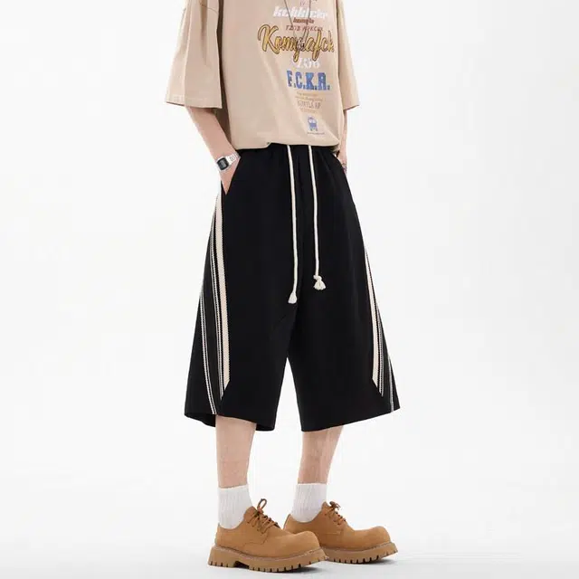 臣目 美式复古慵懒风撞色拼接条纹宽松七分休闲短裤 男款