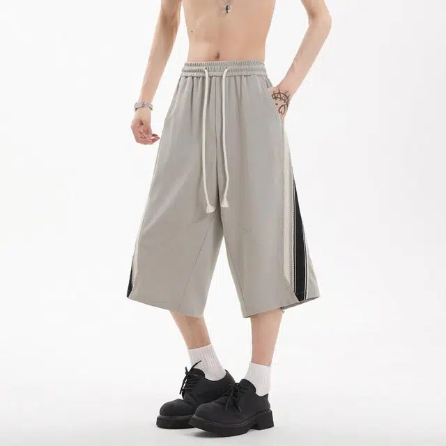 臣目 美式复古慵懒风撞色拼接条纹宽松七分休闲短裤 男款