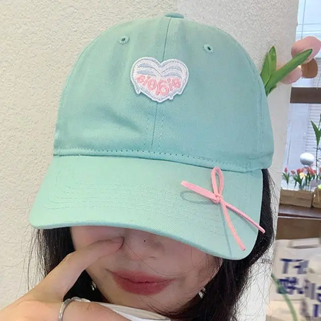 木林森 可爱小煤球爱心刺绣户外出行甜酷辣妹蝴蝶结软糯风时尚潮流百搭大头围显脸小防晒遮阳 棉 鸭舌帽 男女同款情侣款