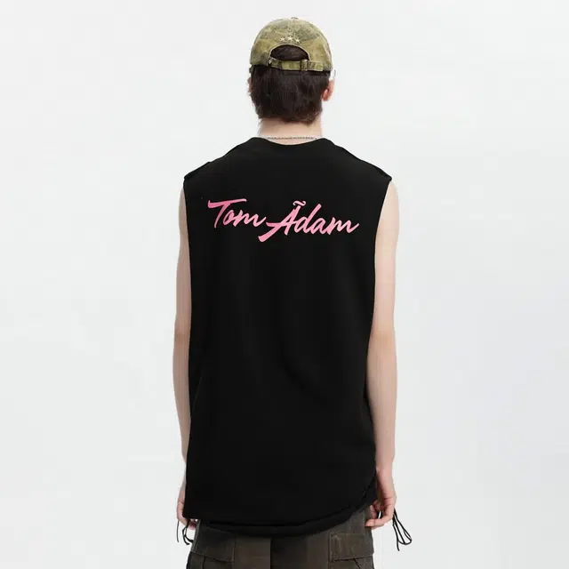 TOM ADAM