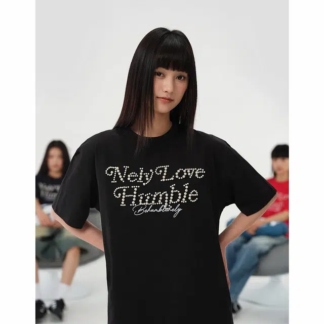 NELY T