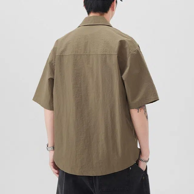 领航骆驼 宽松休闲运动简约纯色短袖衬衫 男款