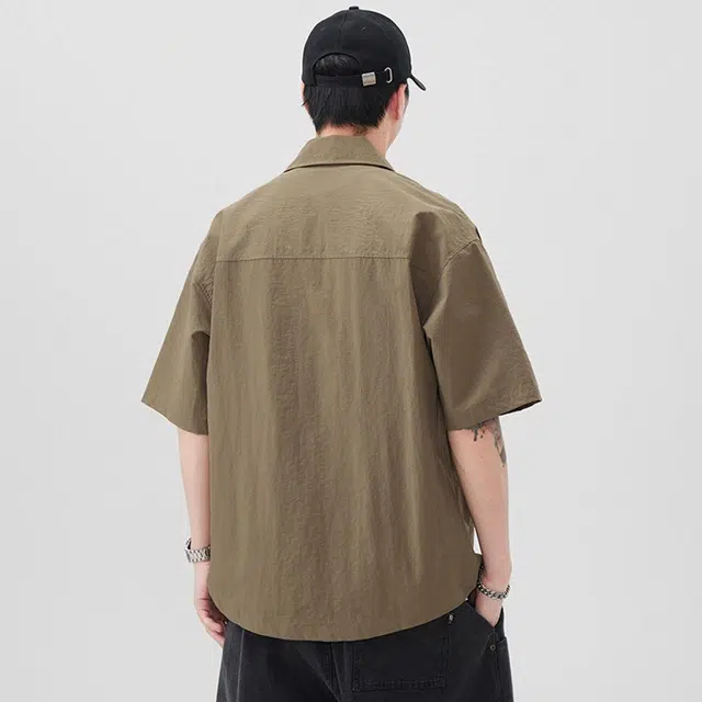 领航骆驼 宽松休闲运动简约纯色短袖衬衫 男款