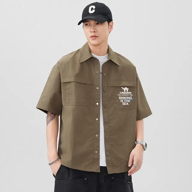 领航骆驼 宽松休闲运动简约纯色短袖衬衫 男款