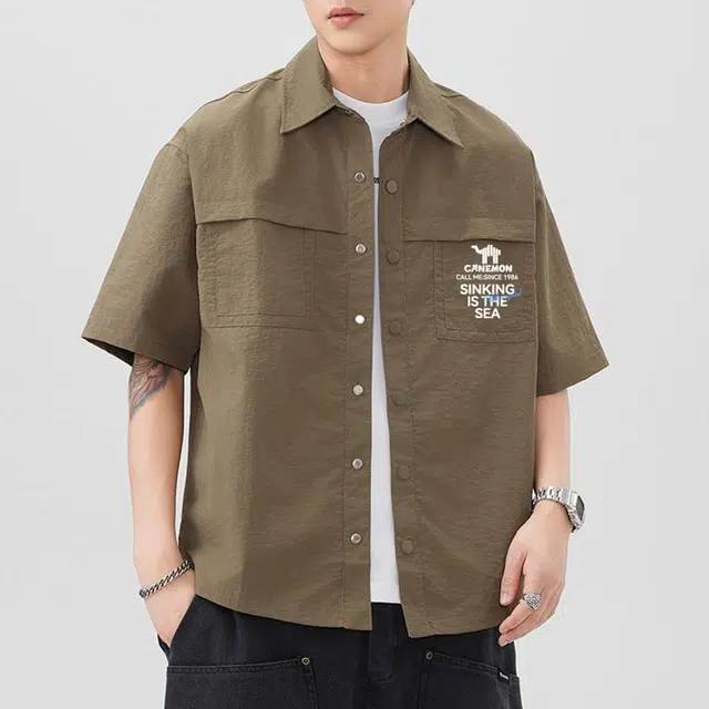 领航骆驼 宽松休闲运动简约纯色短袖衬衫 男款