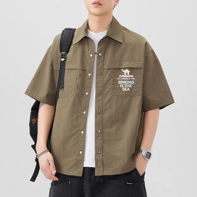 领航骆驼 宽松休闲运动简约纯色短袖衬衫 男款