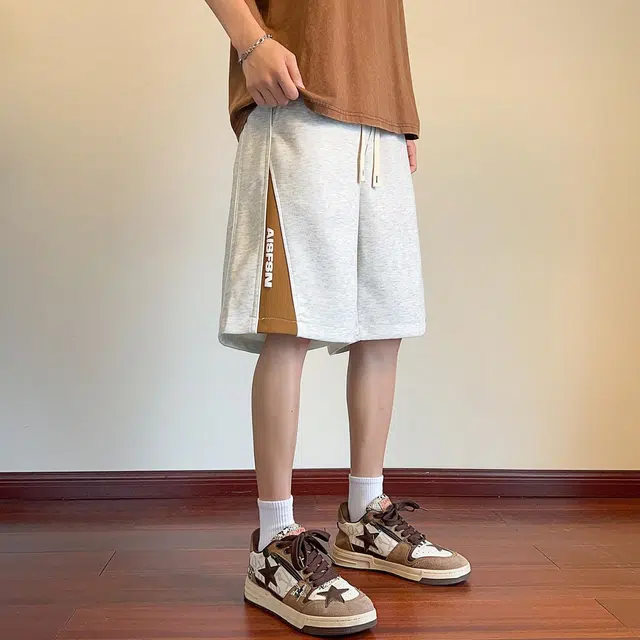 徐太浪 美式高街字母发泡印花拼接设计感潮牌五分宽松舒适大码运动休闲短裤 男女同款