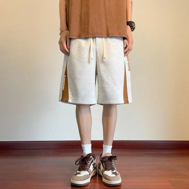徐太浪 美式高街字母发泡印花拼接设计感潮牌五分宽松舒适大码运动休闲短裤 男女同款