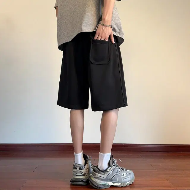 徐太浪 美式高街字母发泡印花拼接设计感潮牌五分宽松舒适大码运动休闲短裤 男女同款