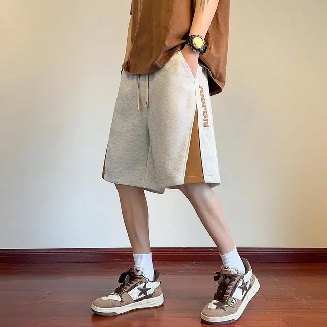 徐太浪 美式高街字母发泡印花拼接设计感潮牌五分宽松舒适大码运动休闲短裤 男女同款