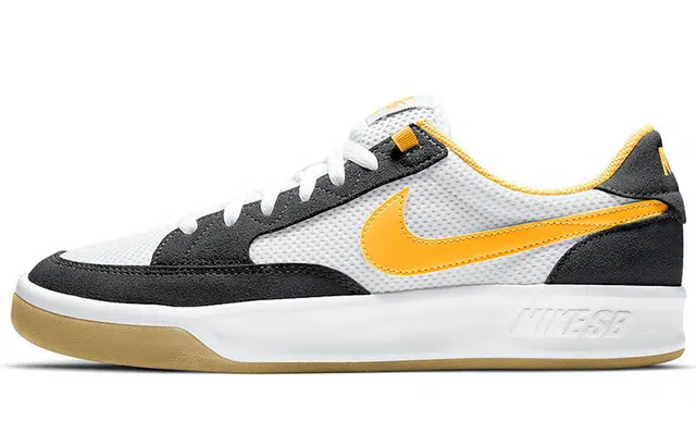 Nike SB Adversary University Gold logo