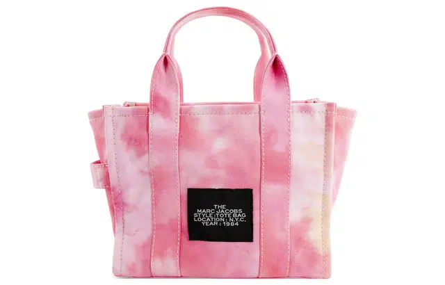 MARC JACOBS MJ The Traveler logo