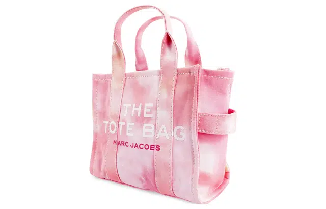 MARC JACOBS MJ The Traveler logo