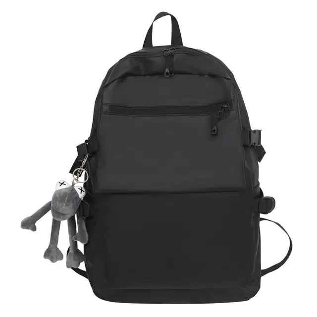 德力熊双肩包带挂件防水牛津布大容量耐磨两色可选轻便双肩背包情侣男女通用