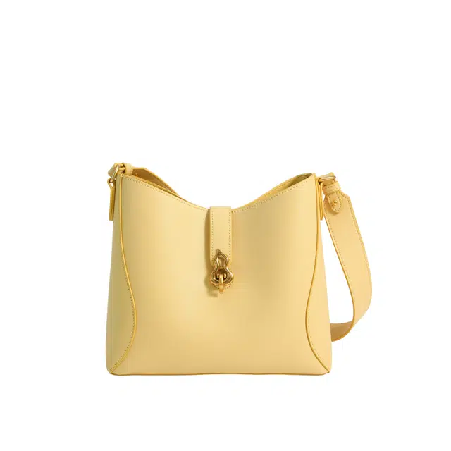 西木汀 高级感小众设计师浪漫症大容量 牛皮 水桶包单肩斜挎包 女款 黄色