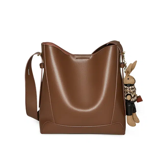 纳兰杜 时尚潮流高级感小众百搭 牛皮 水桶包斜挎单肩包 中号 女款 咖色/米白色