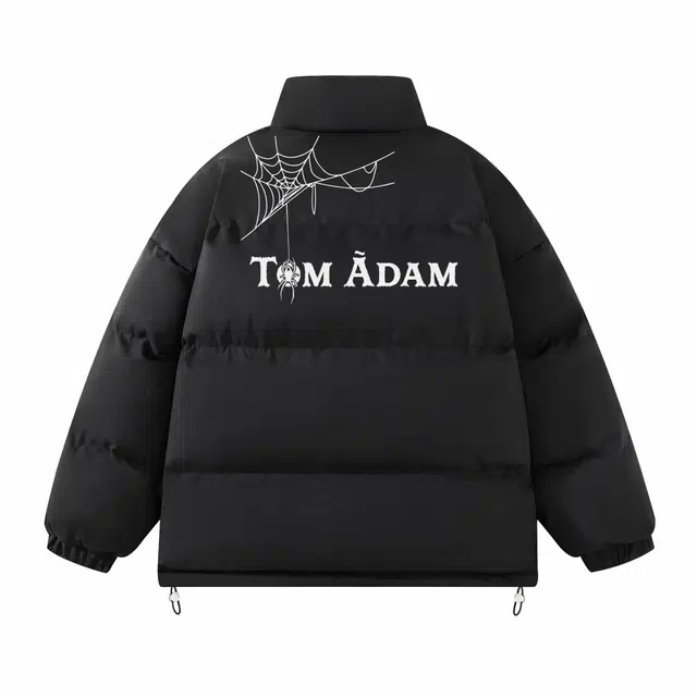 TOM ADAM
