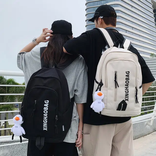尊梵 休闲简约百搭通勤背包学院风户外 尼龙 双肩包 男女同款情侣款 白色/黑色/紫色/绿色/蓝色/粉色