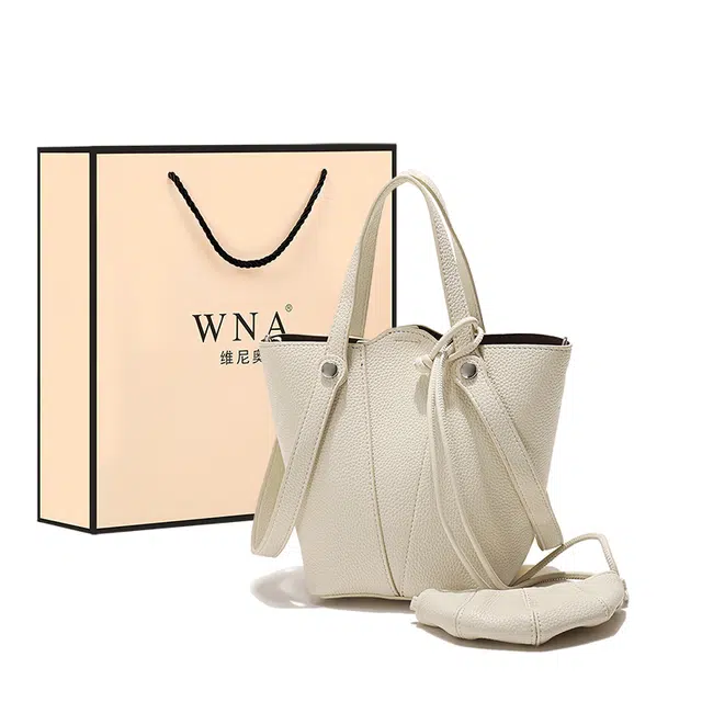 维尼奥 品牌时尚大气荔枝纹水桶包高颜值简约百搭潮流气质休闲通勤精致洋气妈妈 合成革 单肩斜挎手提包 女款 米白/黑色