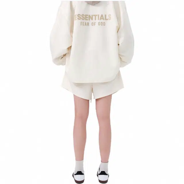 Fear of God Essentials FW23 Running Short Cloud Dancer