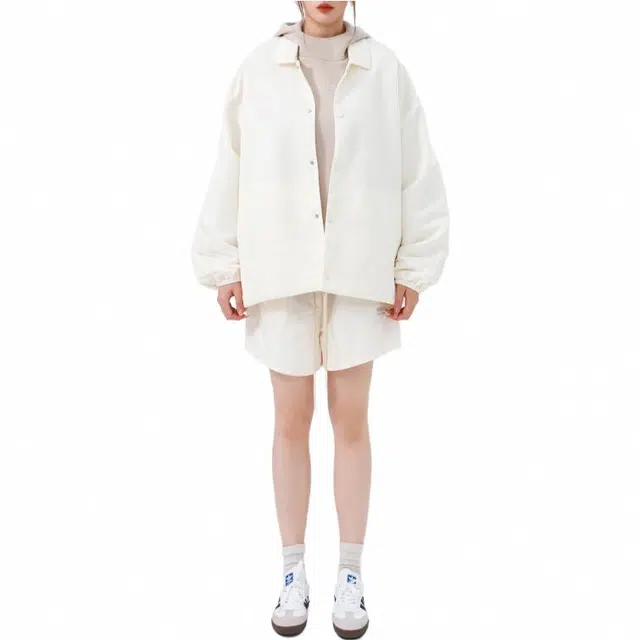 Fear of God Essentials FW23 Running Short Cloud Dancer