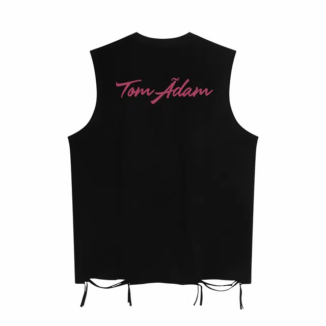 TOM ADAM