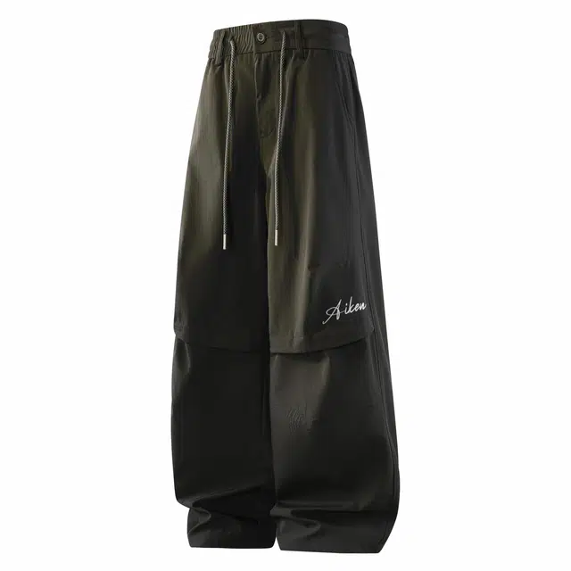 爱肯 美式高街品牌字母签名字体印花简约纯色宽松垂感通勤运动拉链直筒中腰休闲裤 男女同款 黑色