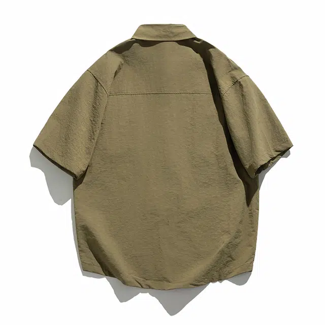 领航骆驼 宽松休闲运动简约纯色短袖衬衫 男款