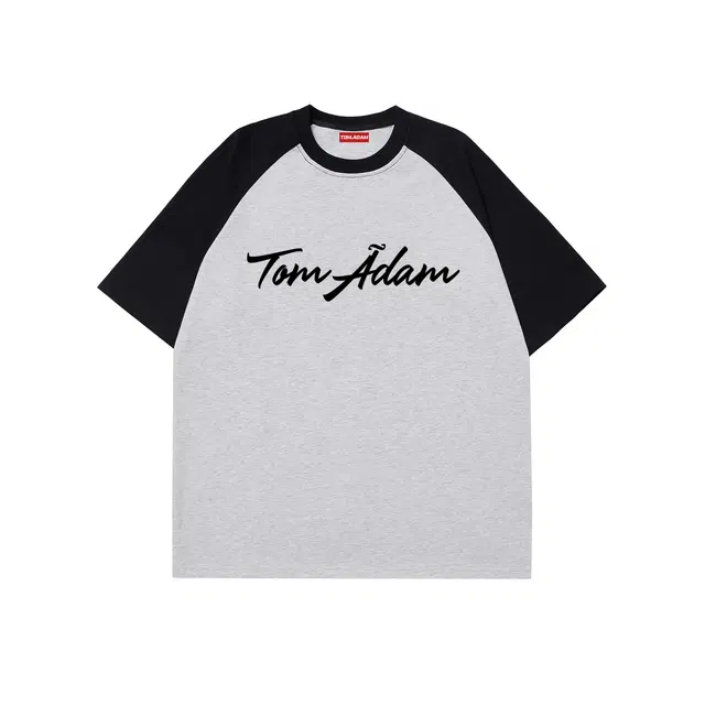 TOM ADAM logoT