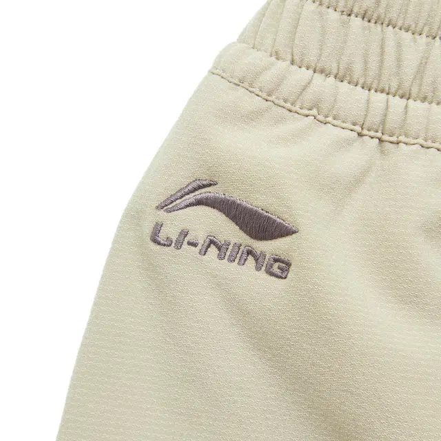 李宁儿童 运动生活系列 童装系列 保暖宽松舒适长裤 中卡其 青少年