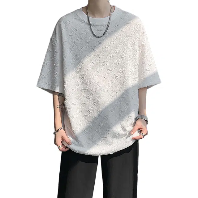 NXNM T