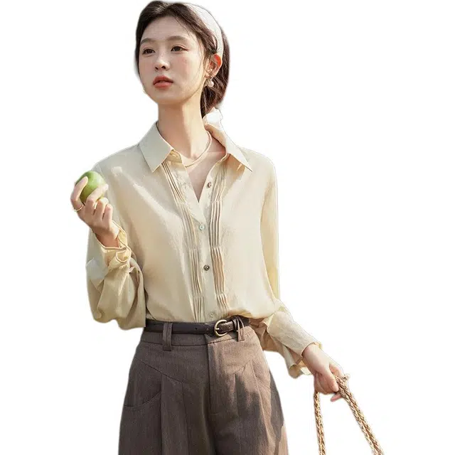 谜秀 波浪打条贝壳简约百搭时尚纽扣宽松通勤设计感长袖衬衫 女款