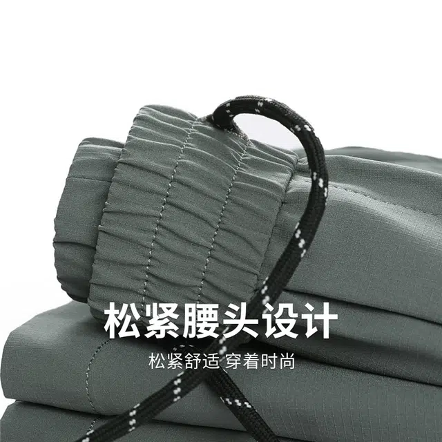 与狼共舞 速干弹力纯色简约宽松四面弹松紧腰五分休闲短裤 男款 灰绿色
