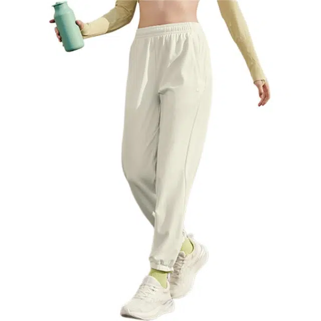 乔丹 舒适休闲简约纯色中腰透气束脚运动长裤 女款 奶油白